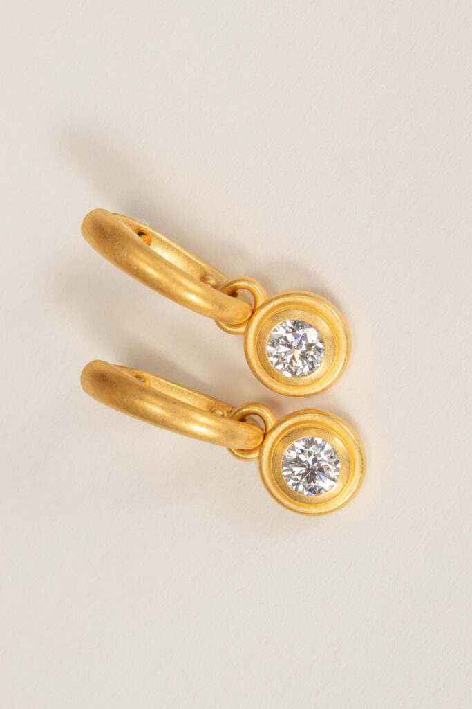 Ohrringe aus 18 Karat Gold mit Diamant