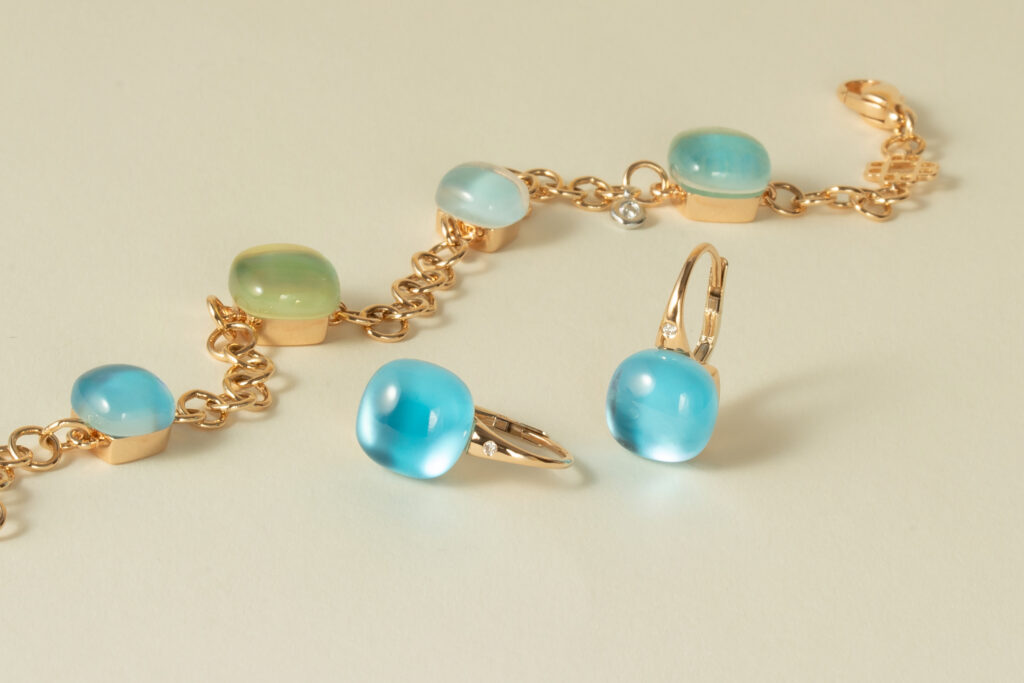 Goldohrringe mit blauen Edensteinen und kleinem Diamant